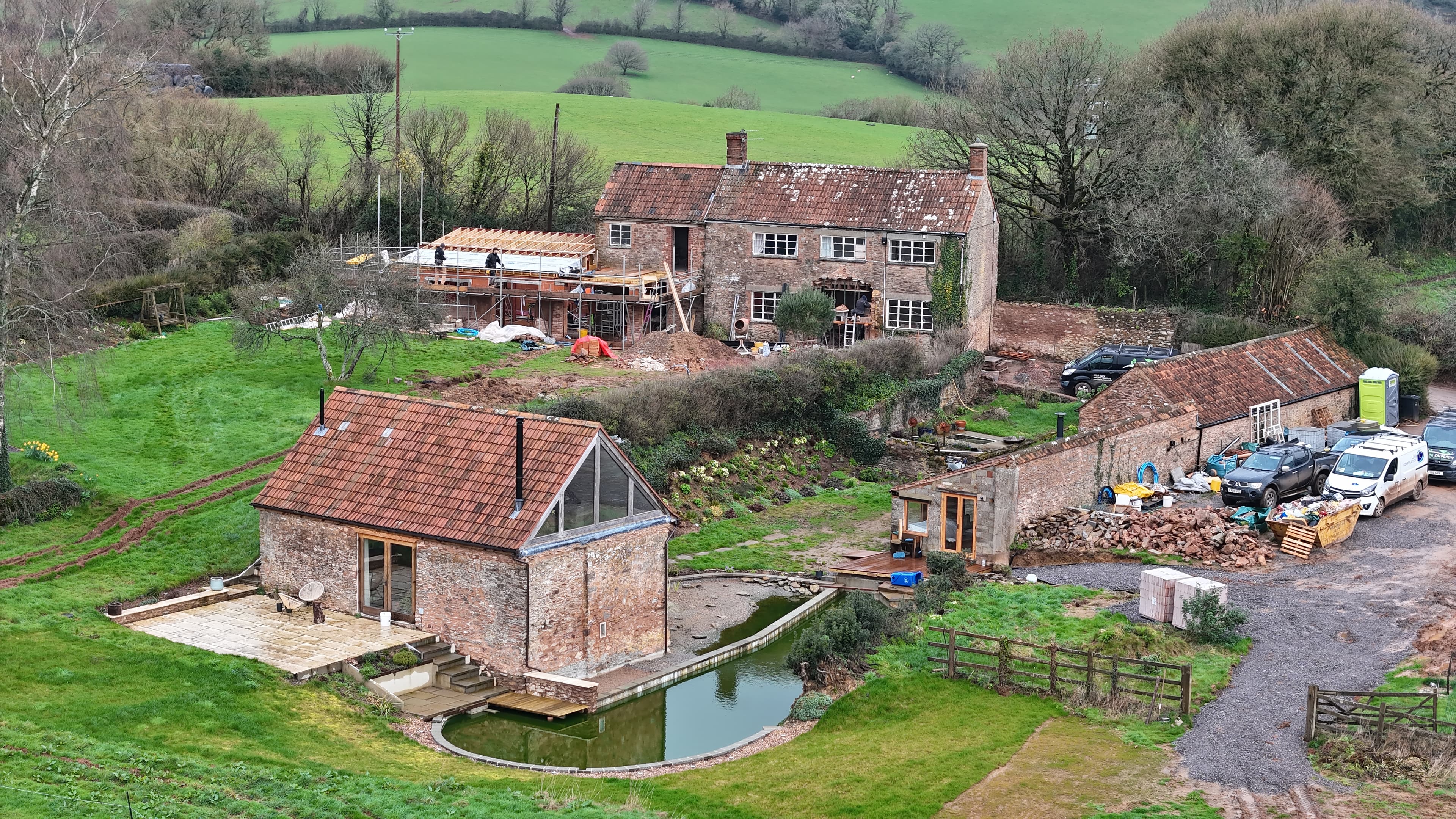 Farmhouse and Triple Barn Renovation